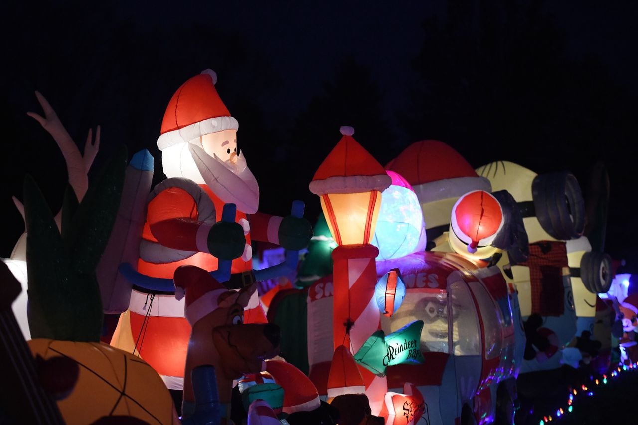 Racking up $1,000 in electricity, family welcomes visitors to holiday-themed display