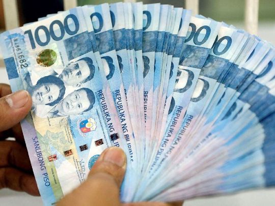 As Philippine holiday spending kicks in, peso advances vs. US dollar