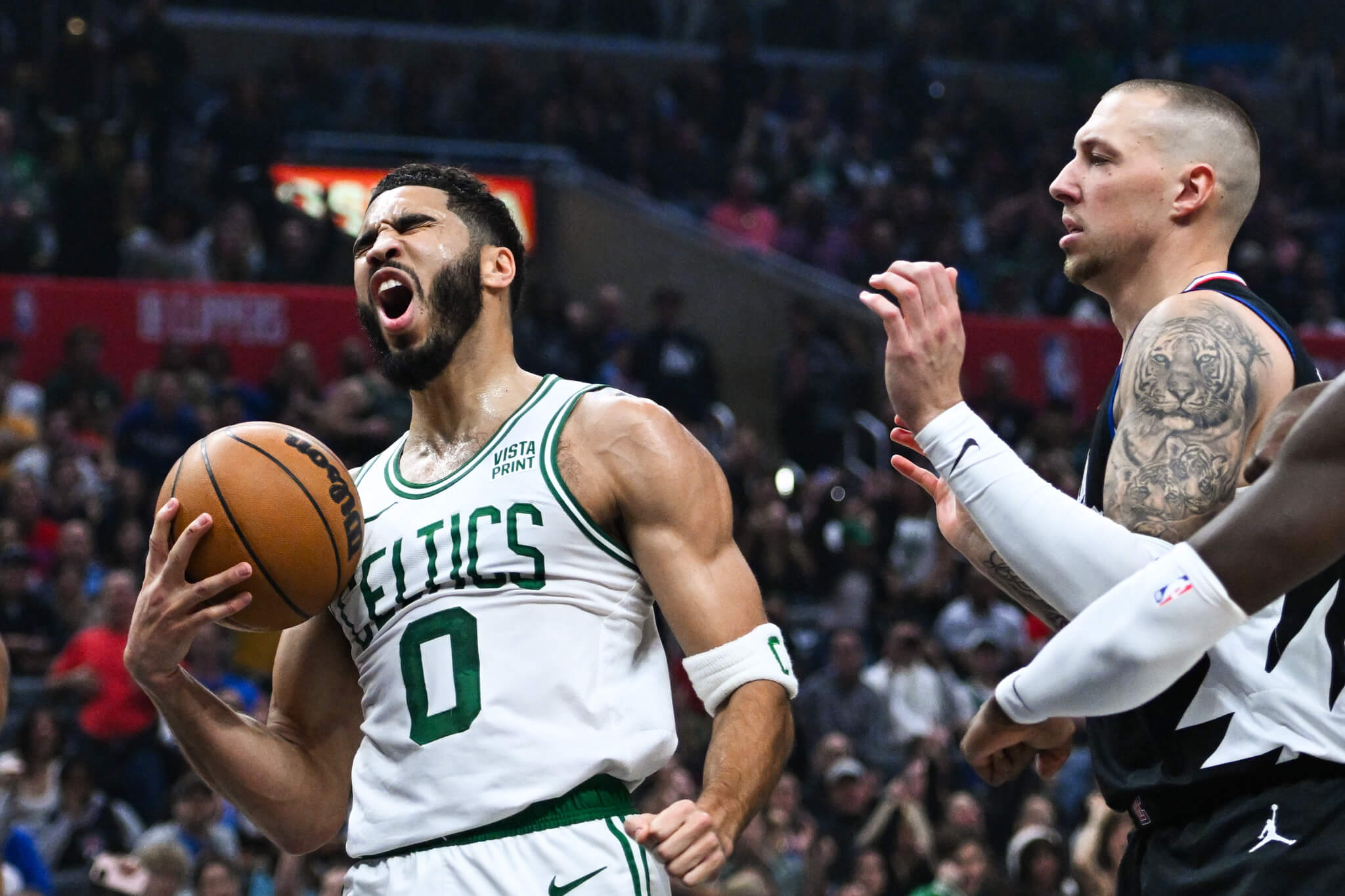 Jayson Tatum plays through pain as Celtics offense keeps taking off