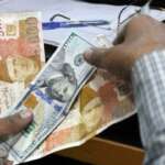 IMF talks put rupee on the edge