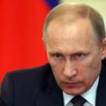 Putin praises army in low key New Year’s Eve address