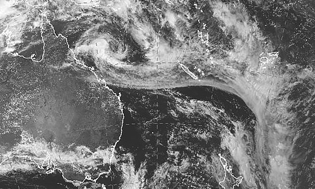 Tropical low off northeast Australia expected to become cyclone and…