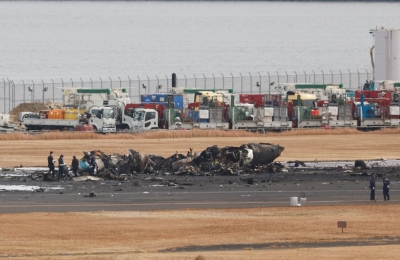 Doomed Japan plane on third quake mission when runway disaster hit