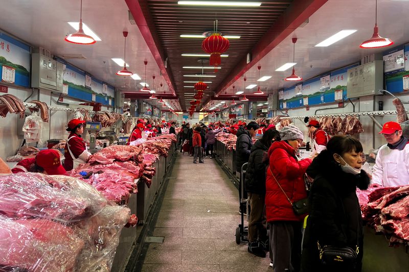 Beijing’s butchers a glum bunch as Lunar New Year meat sales slow