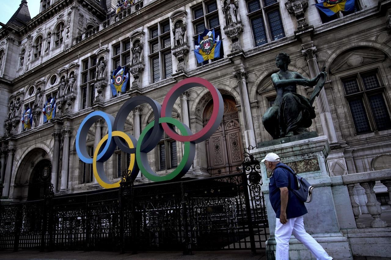 As the Olympics loom, Parisians ask: Should we skip town? Games organizers work to win their hearts