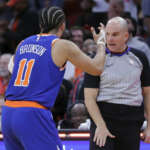 Aaron Holiday’s free throws on wrong call lift Rockets over Knicks