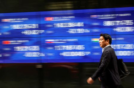 Asian shares track Wall Street higher; China deflation risks persist By Reuters