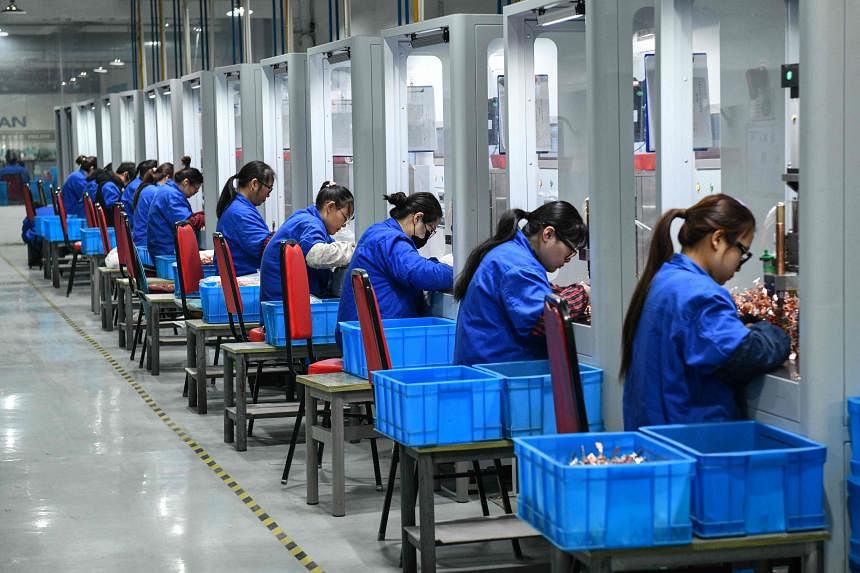 China factory activity shrinks again with economy hurt by weak demand